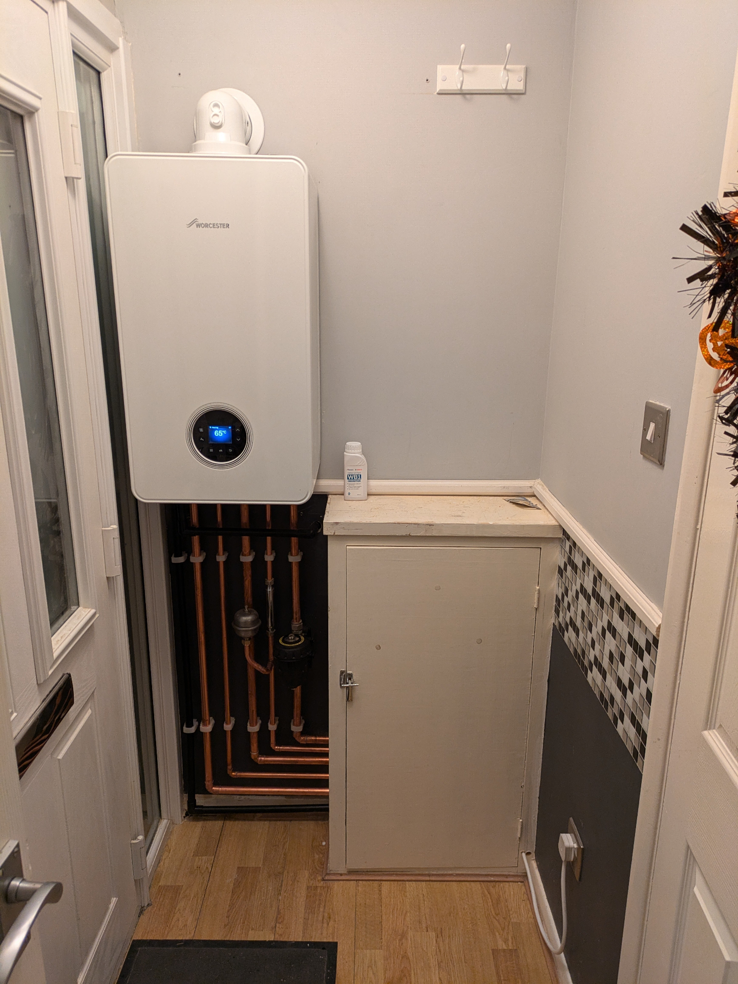 Worcester Bosch combi boiler installation with neat copper pipework by GO Plumbing and Heating