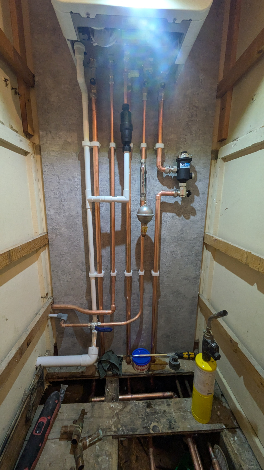 Tidy copper pipework behind new boiler